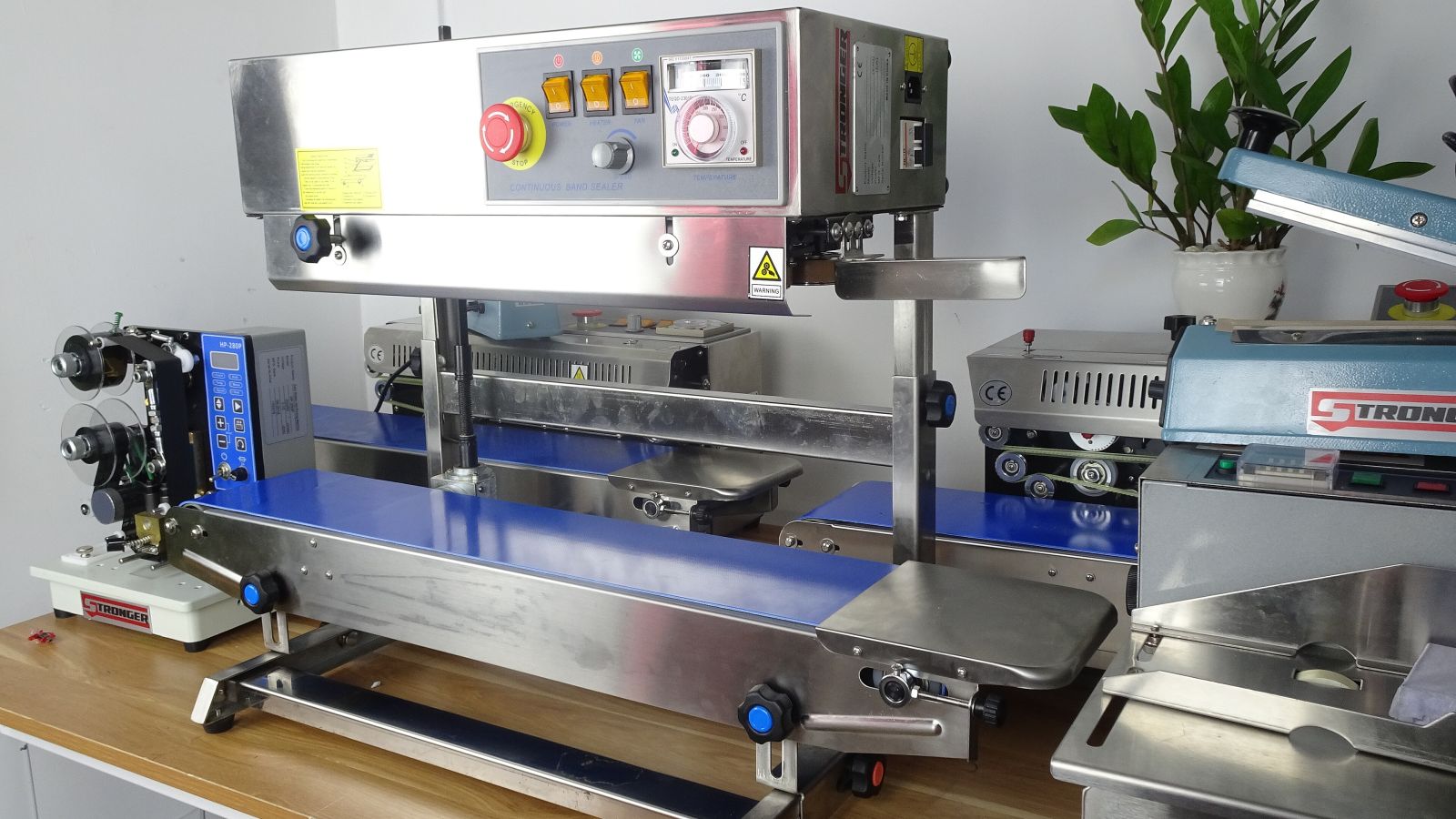 Continuous band heat sealer machine